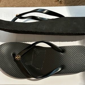 Tory Burch wedge flip flops with gold emblem